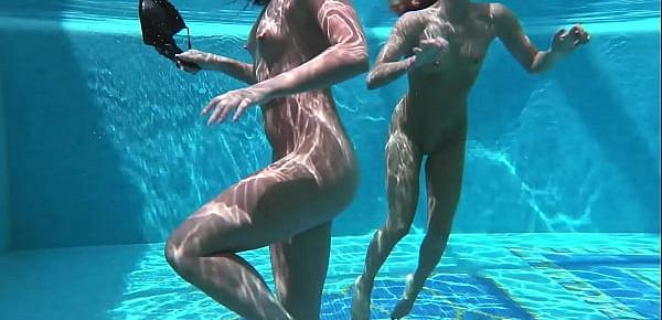  Jessica and Lindsay swim naked in the pool